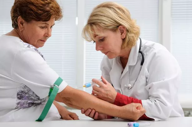 Woman getting blood test
